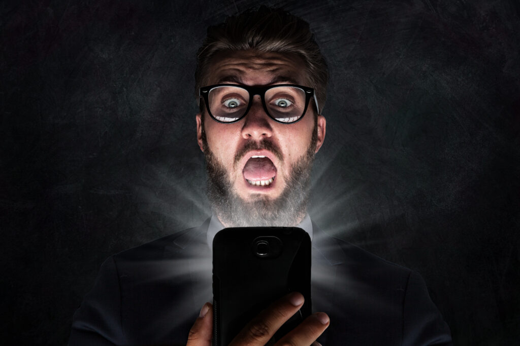 guy looking at phone
