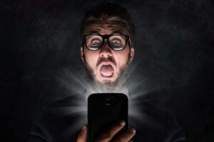 guy looking at phone